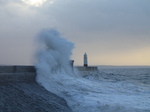 SX33381 Waves at Porthcawl lighthouse.jpg